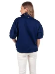 emily-mccarthy-poppy-top-navy-OPnkVsFm-0.webp